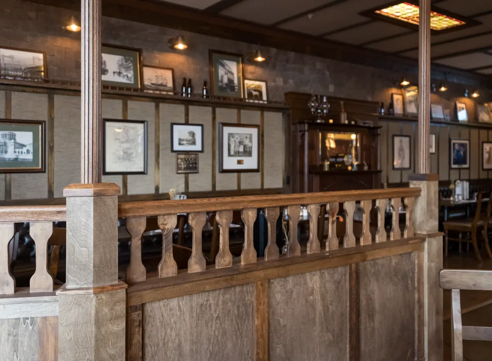 Wooden divider and dining room at Delany’s Public House